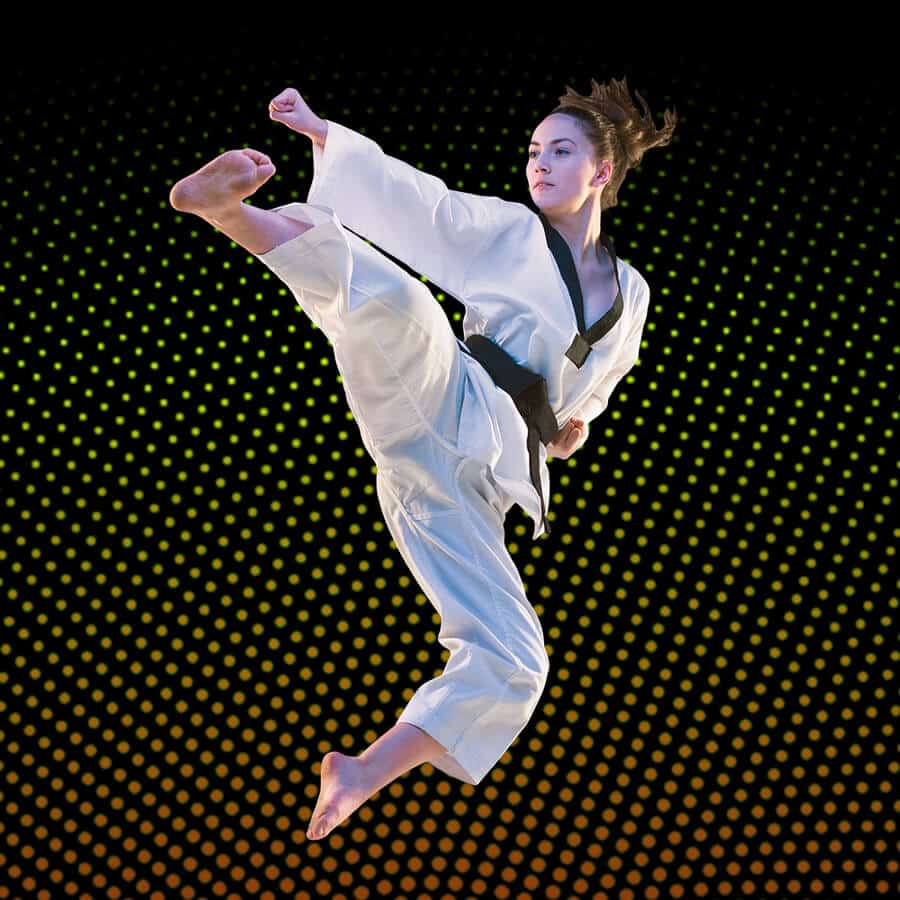 Martial Arts Lessons for Adults in Chandler AZ - Girl Black Belt Jumping High Kick