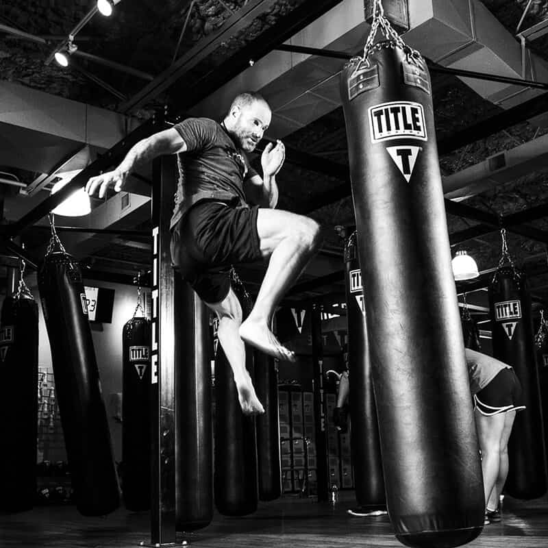 Mixed Martial Arts Lessons for Adults in Chandler AZ - Flying Knee Black and White MMA
